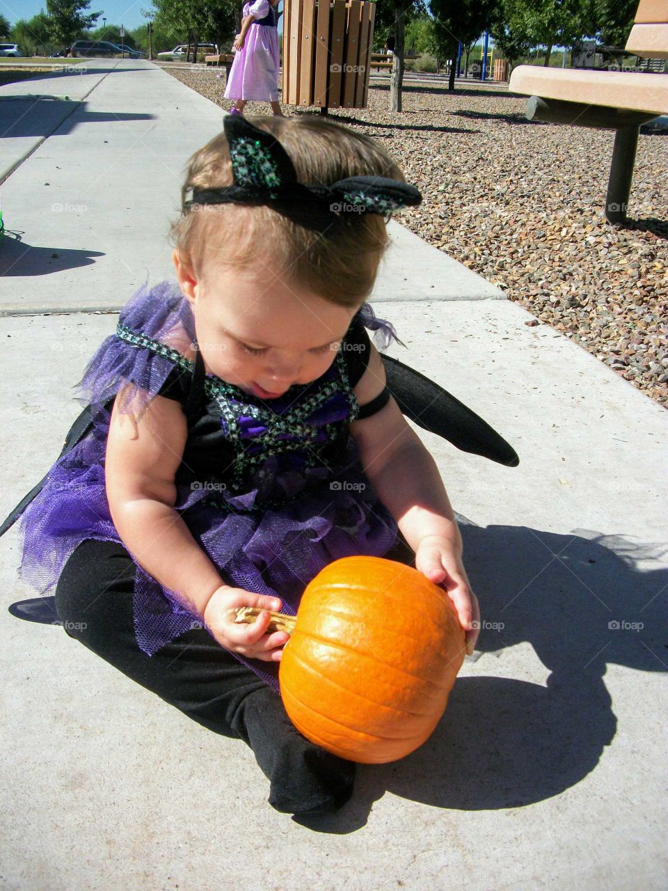 Baby with pumpkin