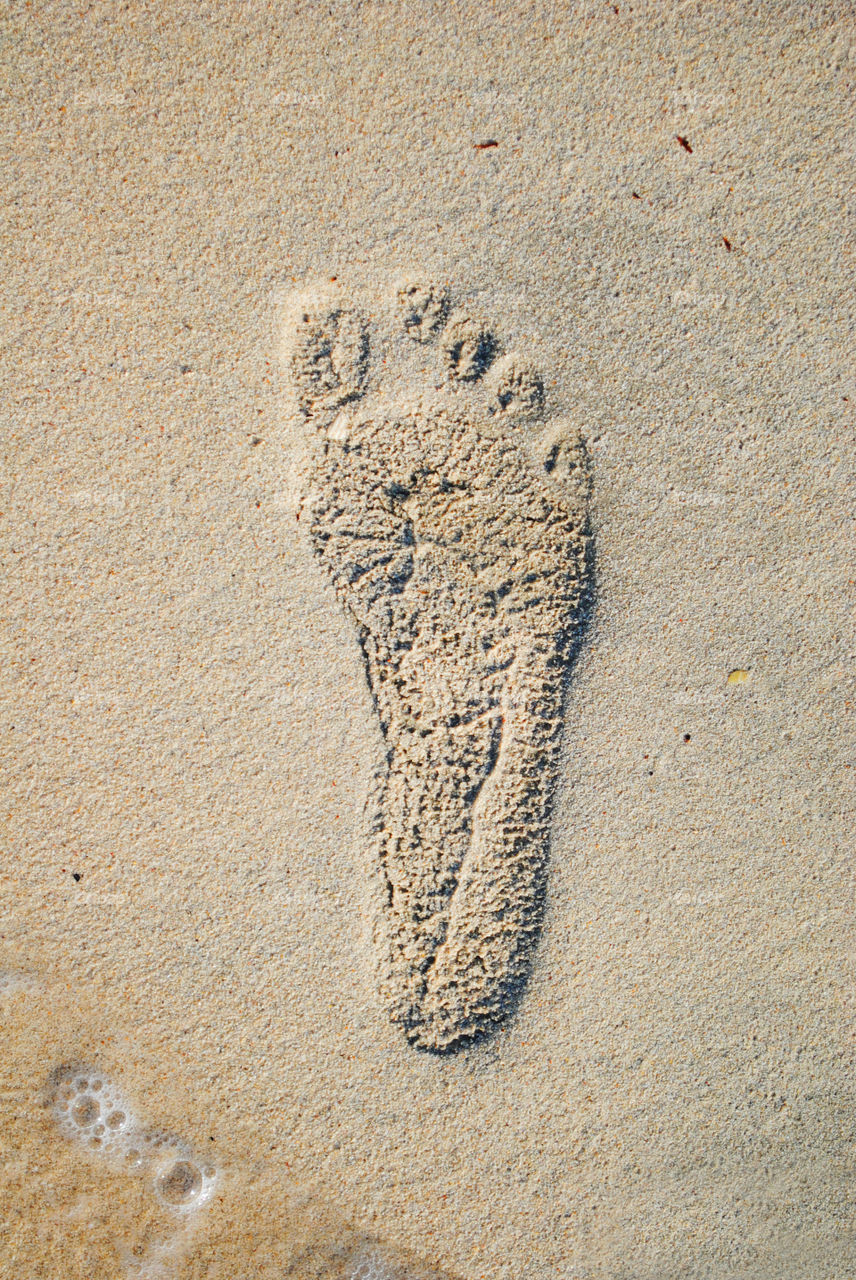 Foot print on beach sand