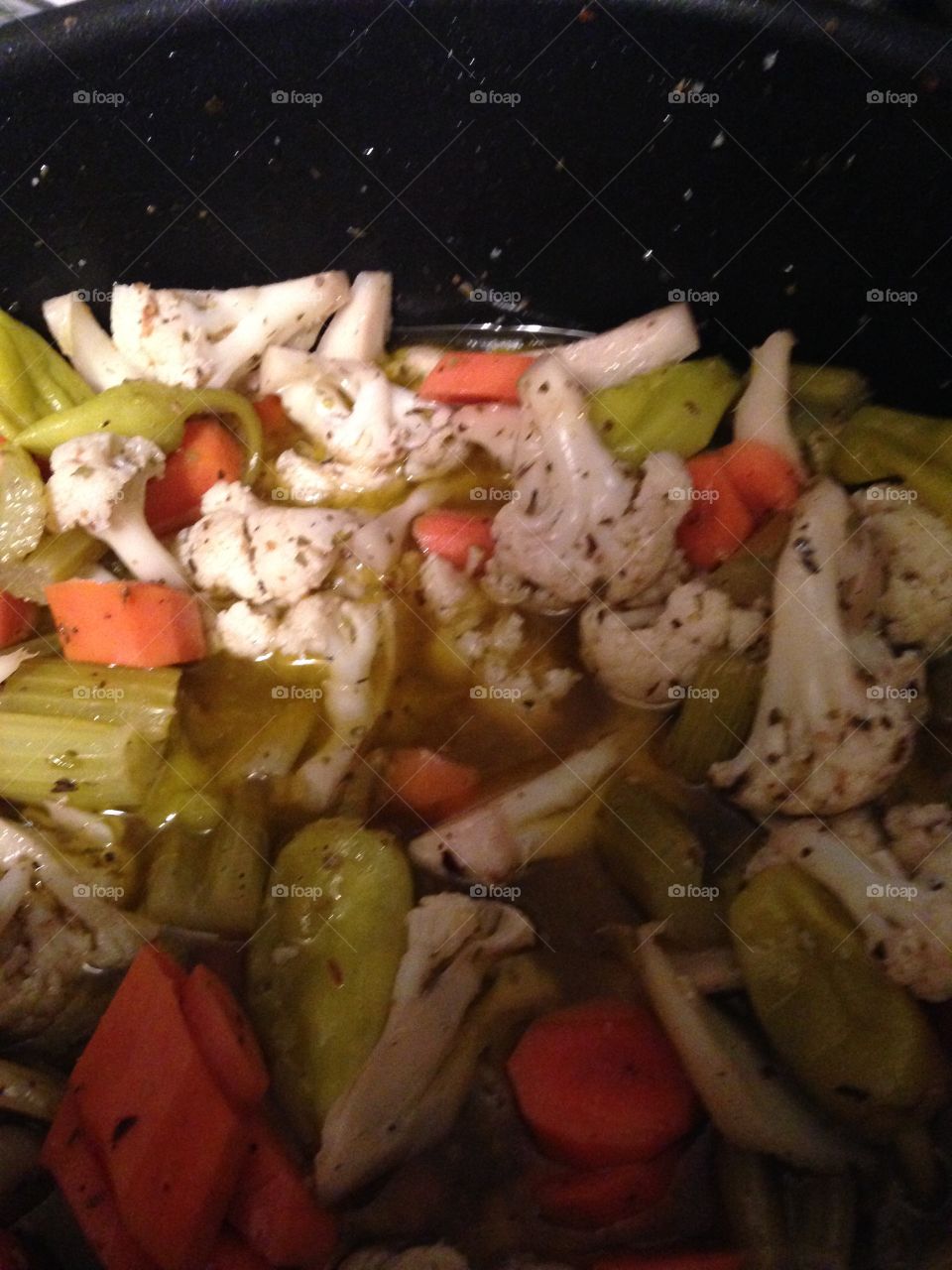 Cauliflower, celery, carrots and peppers in a savory oil and vinegar dressing perfectly spiced with salt, pepper and oregano. Perfect side dish to any meal.