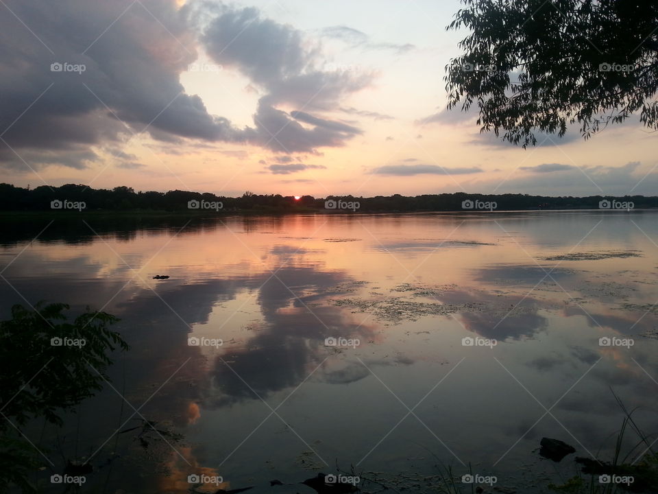 sun setting on phalen lake