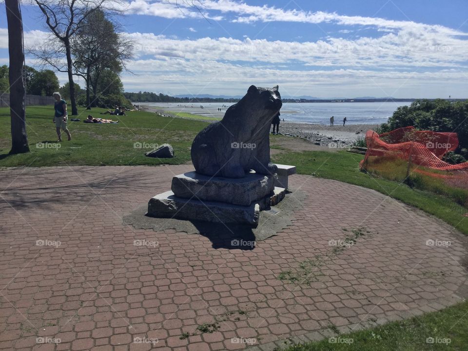 This is a bear statue in White Rock, British Columbia. It’s near the Pacific Ocean.