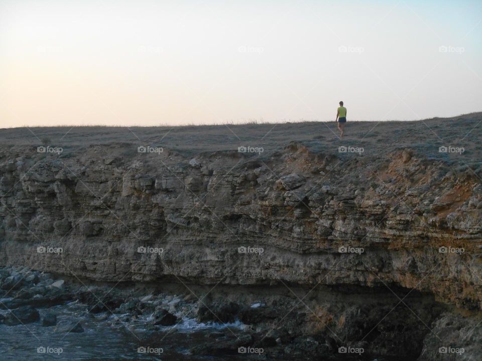 landscape sea cliff and person walking