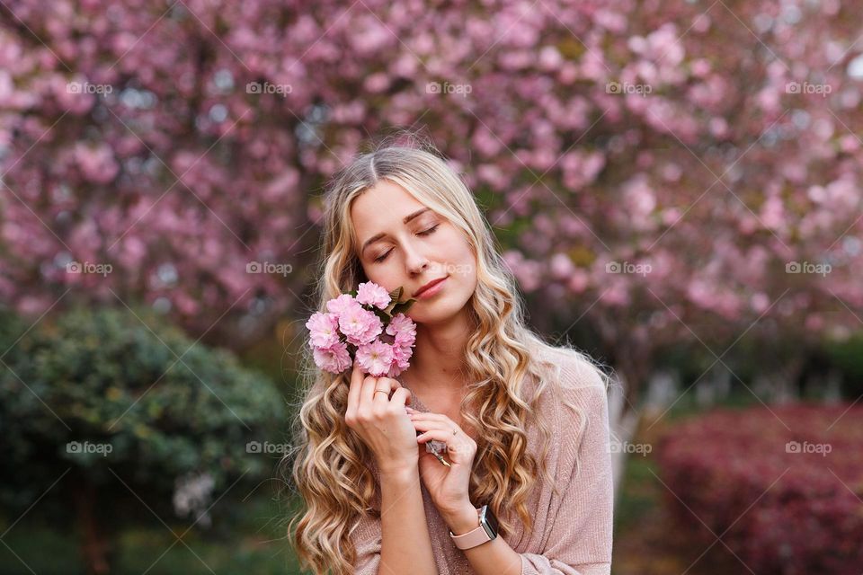 Beautiful woman with sakura 