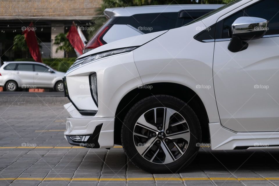 white car in the parking area