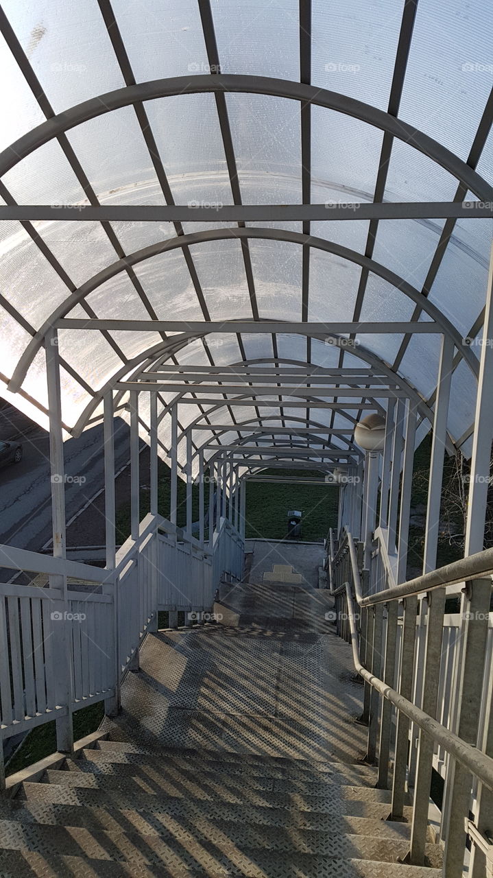 metal grey stairs going down