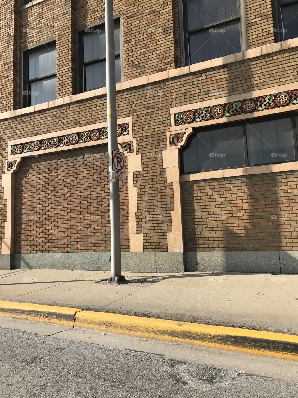 As the passenger in a car, this is the sidewalk and building in my view.