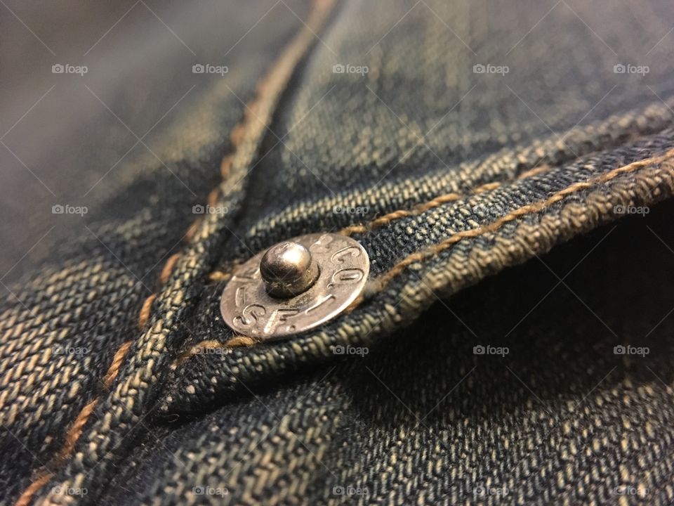 Jeans pocket rivet closeup
