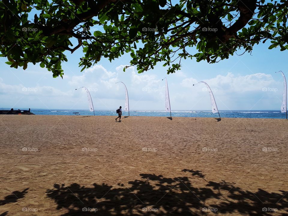 under the tree, sanur beach bali