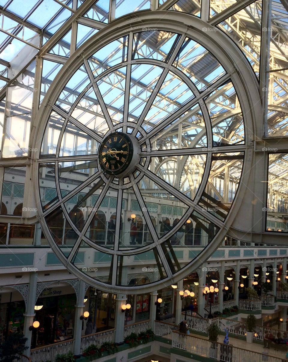 Round clock face and mount in a shopping centre, Dublin 🇮🇪