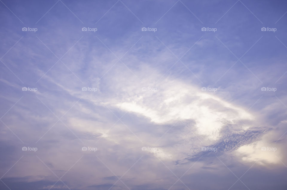 The beauty of the sky with clouds and the sun.