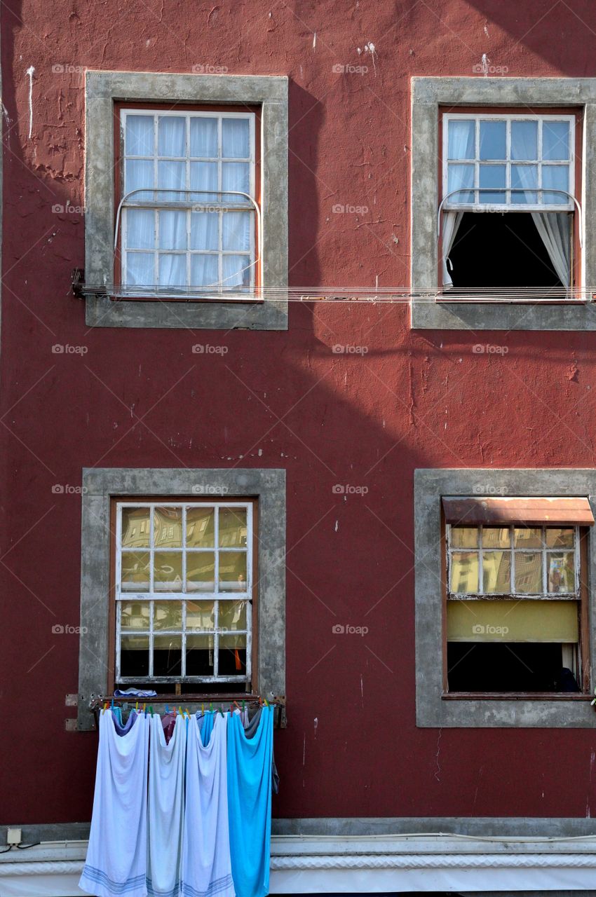 Laundry hanging on window