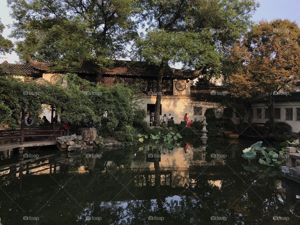 Along with two imperial Summer Palaces (one in Beijing and one in Chengde, about 150 miles north of Beijing), and Humble Administrator’s Garden in the same city of Suzhou, Lingering Garden is considered one of the four finest gardens in all of China. Together with other several classical gardens in Suzhou, it was listed as a UNESCO World Heritage Site in 1997.

The Green Shade Pavilion in the Central Garden, one of the fours distinctive sections (Entry, Central, East and West) seven here in the picture is probably the prettiest scene in the entire garden. #Suzhou #Garden #China

