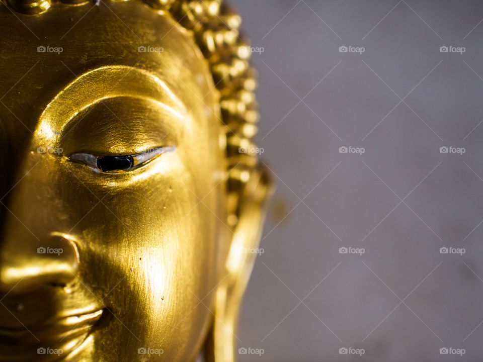 Buddha statue face.