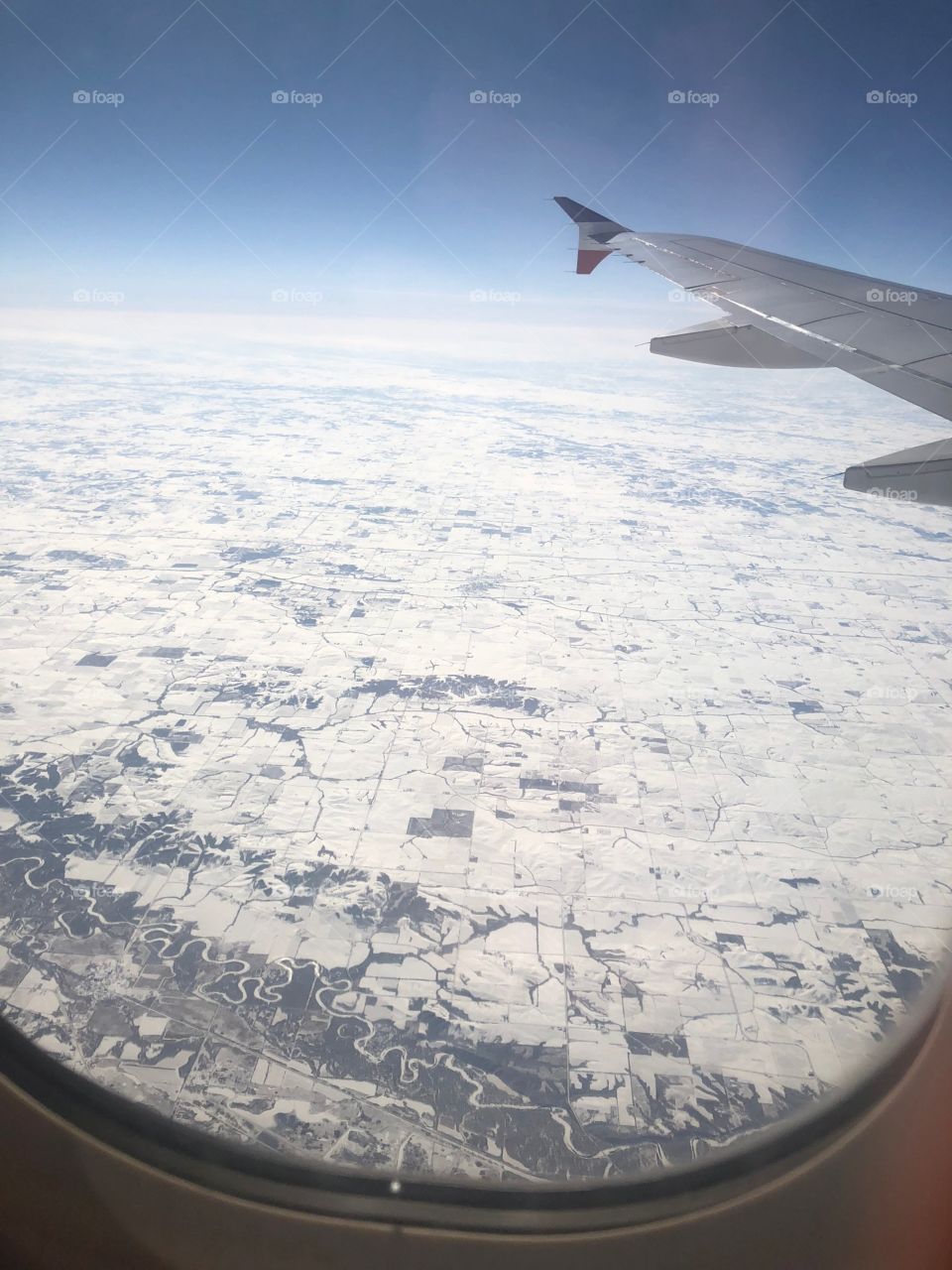 Flying over to Las Vegas from New York sore this view , snow everywhere.