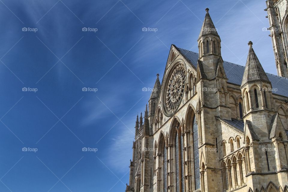 York Minster on a beautiful day under a bright blue sky.