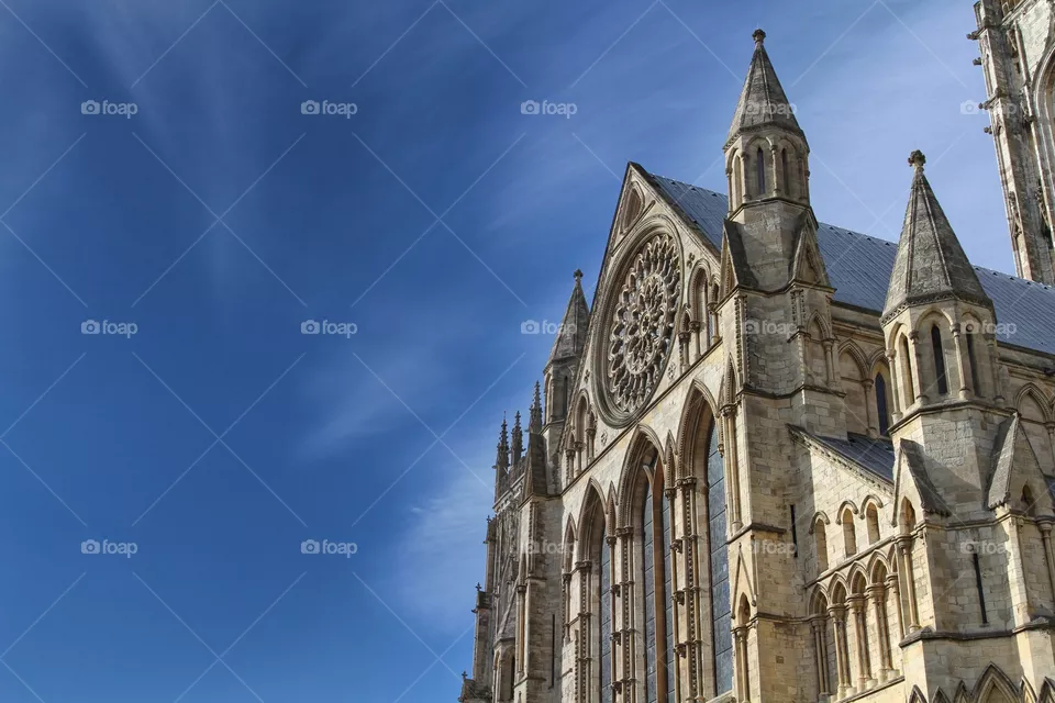 York Minster on a beautiful day under a bright blue sky.