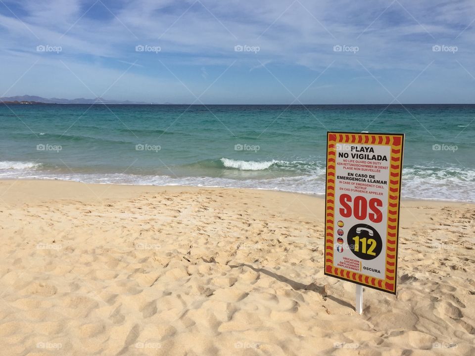 Warning sign on a Spanish beach 