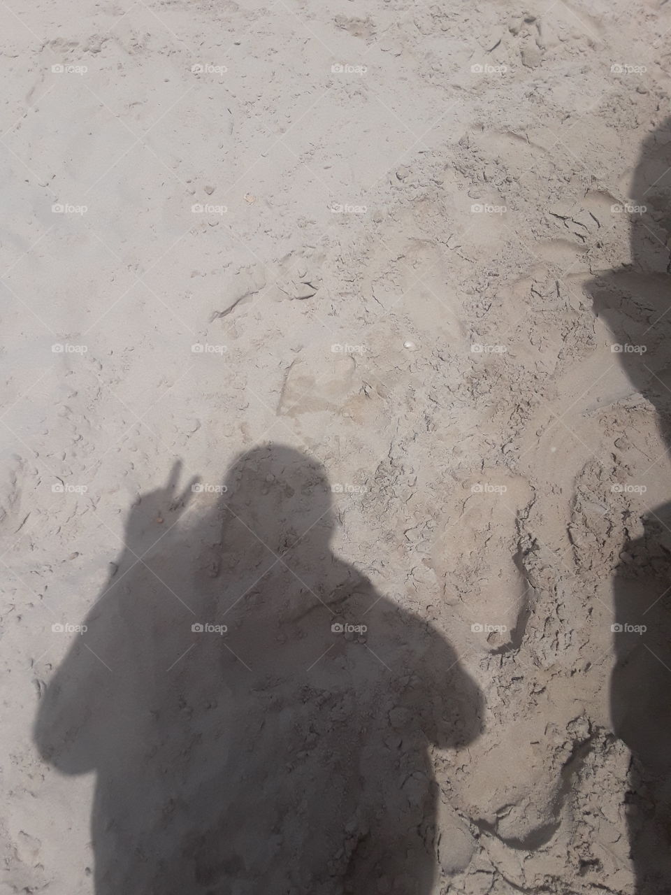 my shadow on the sand
