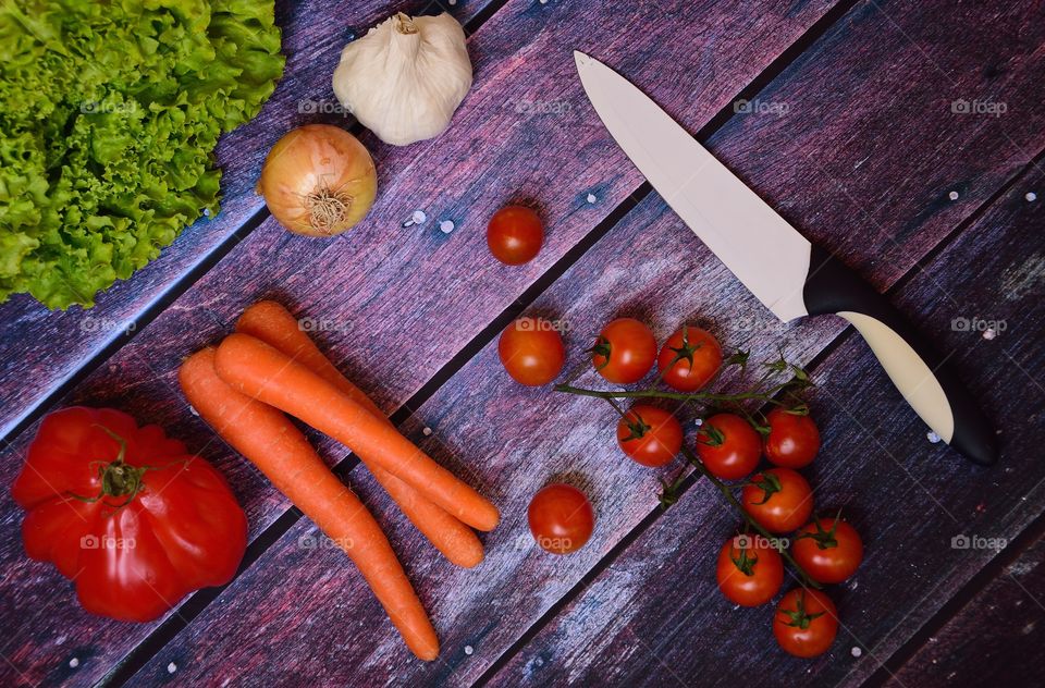 Various vegetables on wooden planks