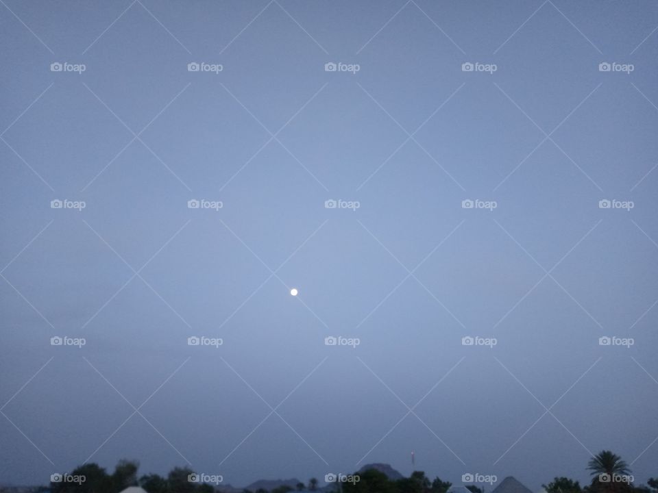 moon at evening, when darkness is about to come.