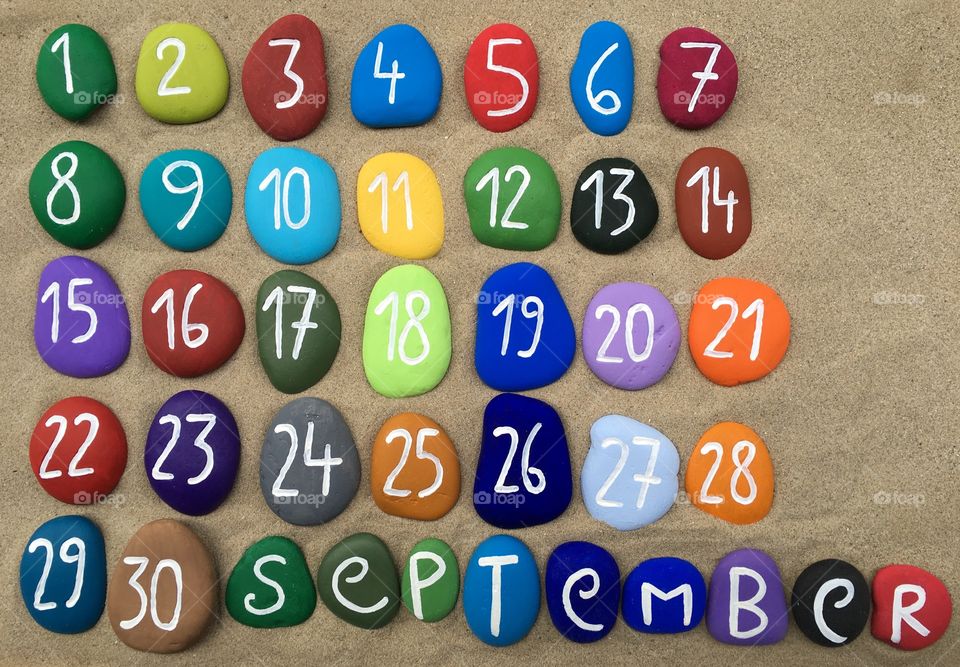 September calendar on colored stones