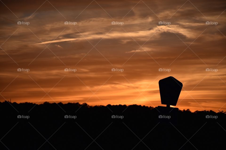 County Sign with Sunset background 
