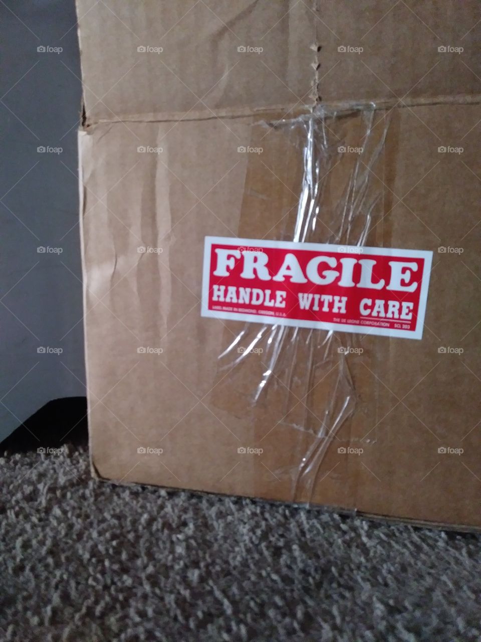 box with red fragile sticker