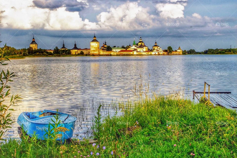 Sun setting over lakeside Ferapontov Monastery - Vologda Oblast, Russia