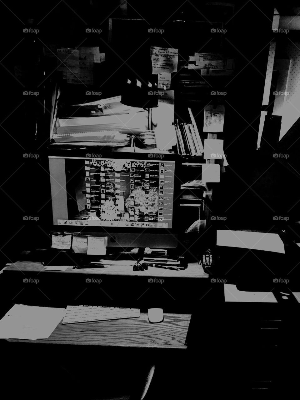 Working from home at an unorganized work space & desktop computer. Pic is in B&W mode.