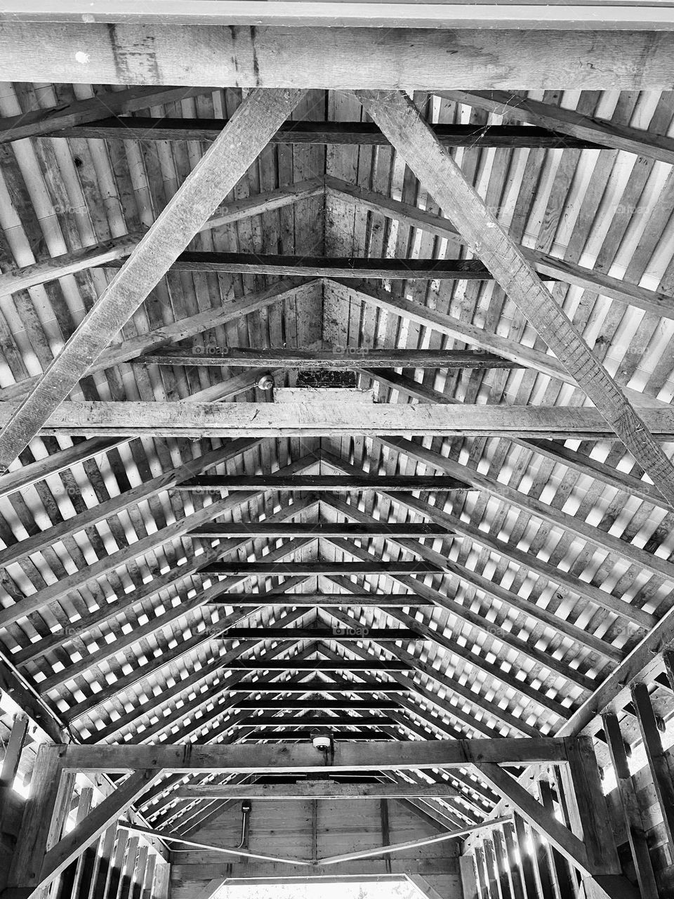 The wooden ceiling of a covered bridge