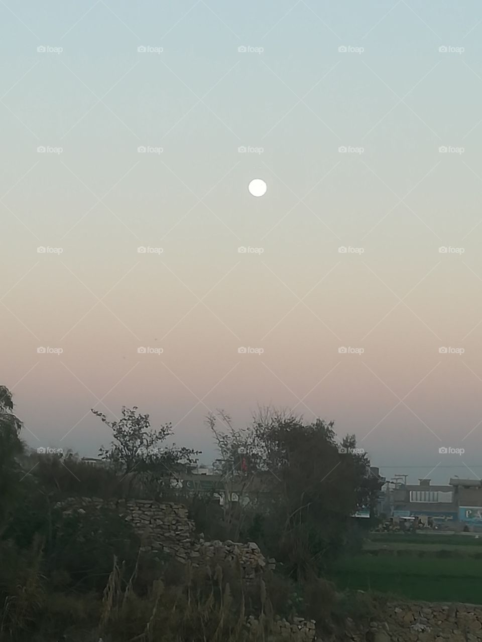 The Early Moonlight in Pakistan.
its still not dark but moon is already seen so clearly.