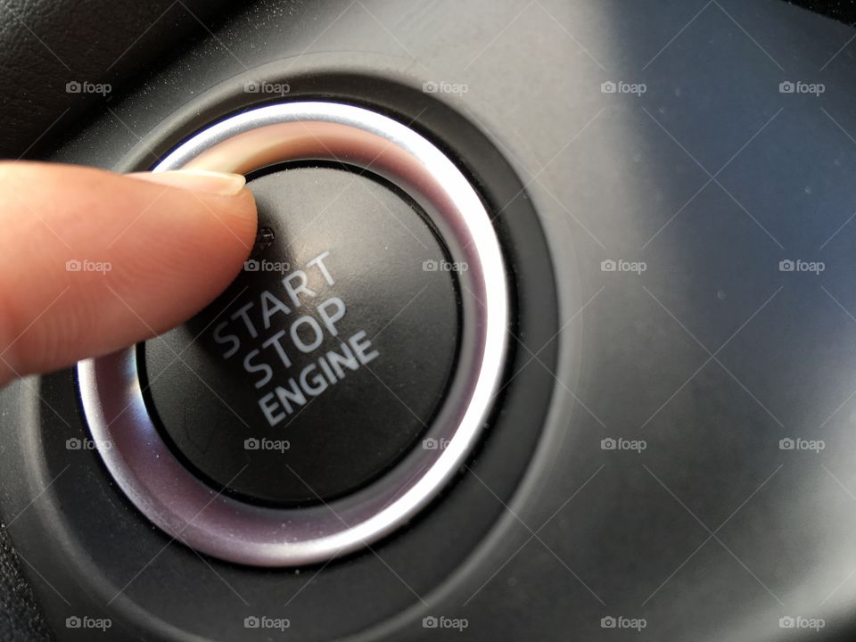Finger hit a push start in a car