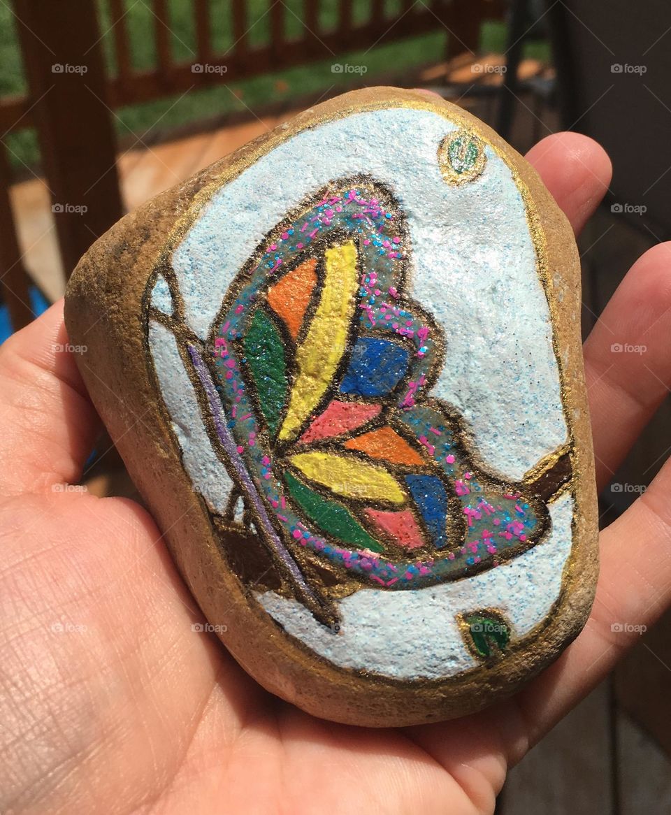 A perfectly painted rock, to share a little bit of art and kindness around the community. This is a Simple butterfly. Hand painted by me.
