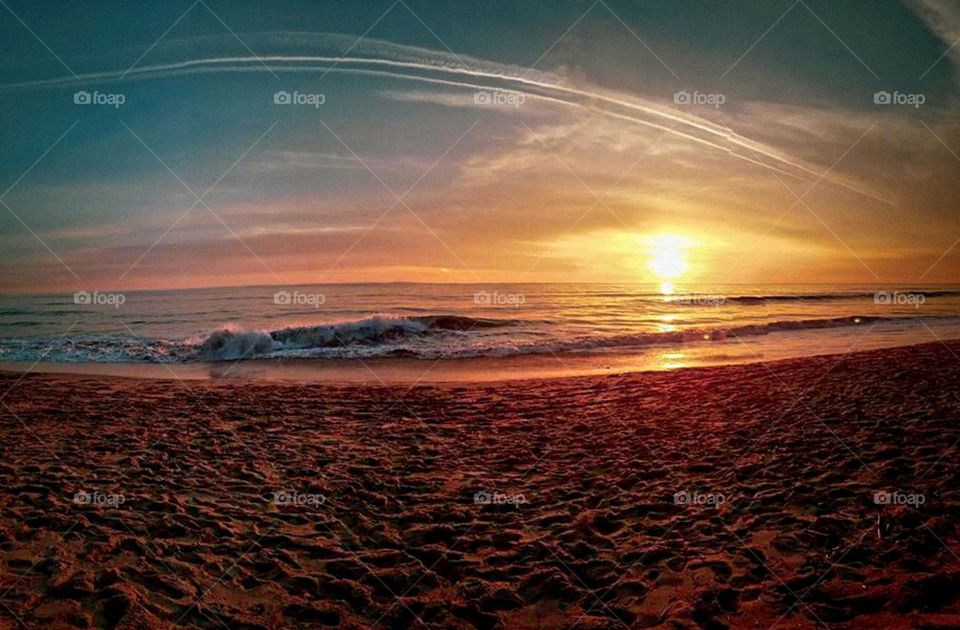 Watching the sun set into the Pacific Ocean in Southern California. Feeling grateful that I get to experience nature's beauty with all of my senses in tact. Suddenly I realized that maybe, just maybe, things may not be as bad as they seem.