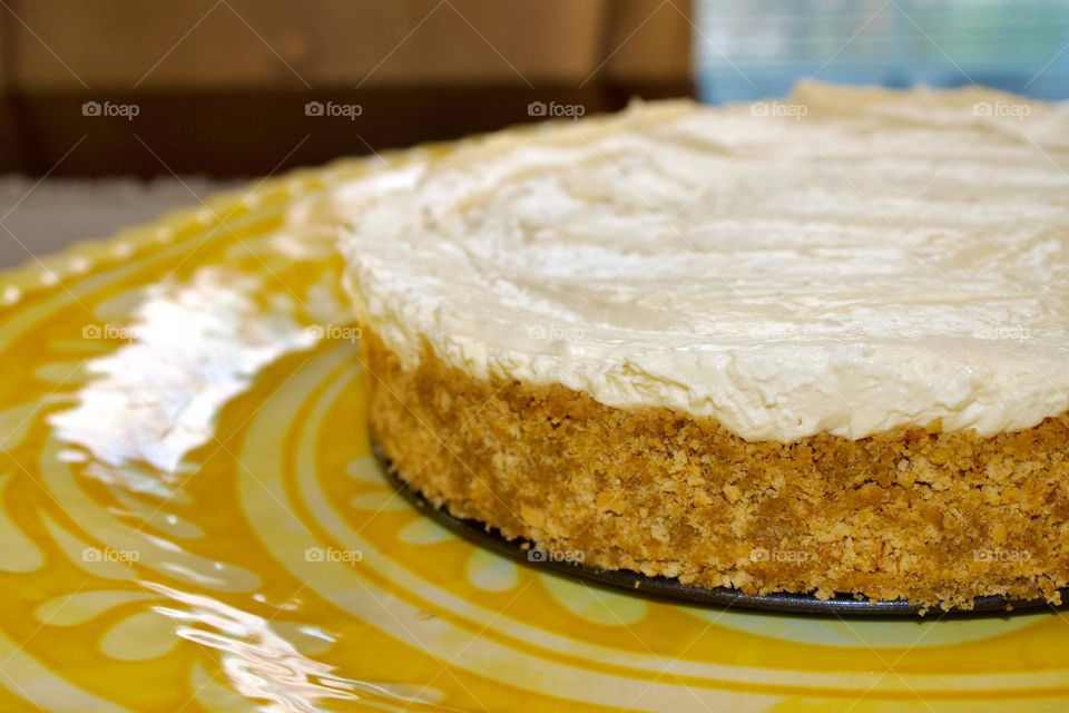 Plain, no bake cheesecake with a graham cracker crust