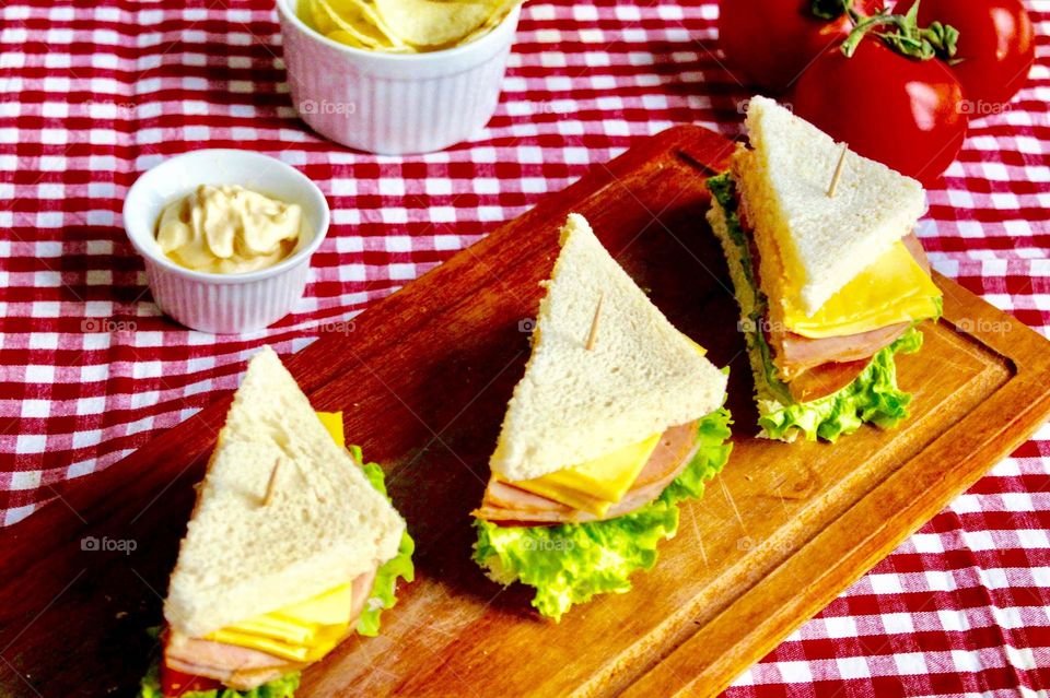 Cheese and ham sandwiches with salad