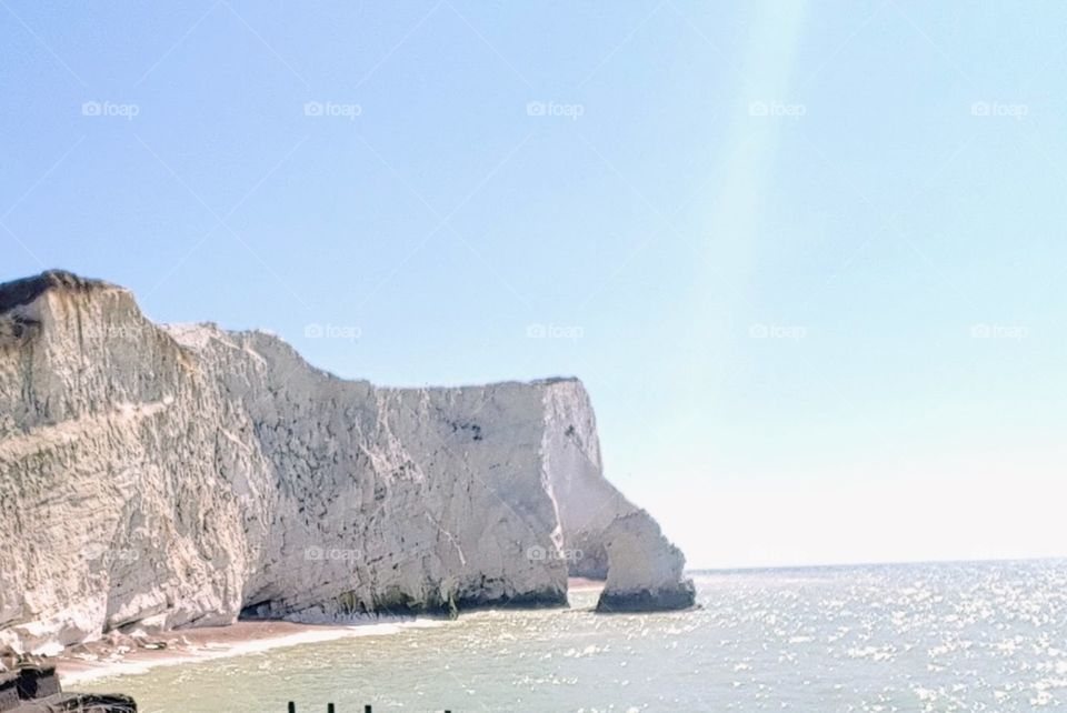 white cliffs near the sea shore