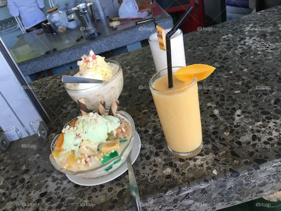 Halo-halo, mixed fruit in ice and mango and coconut shakes from the Philippines
