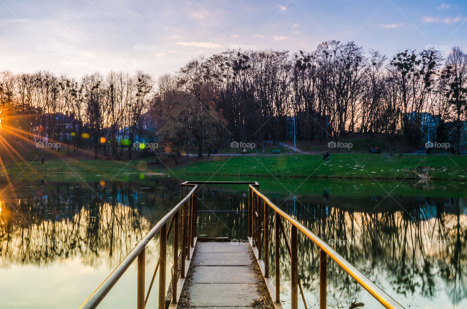 city park with lake in the spring season