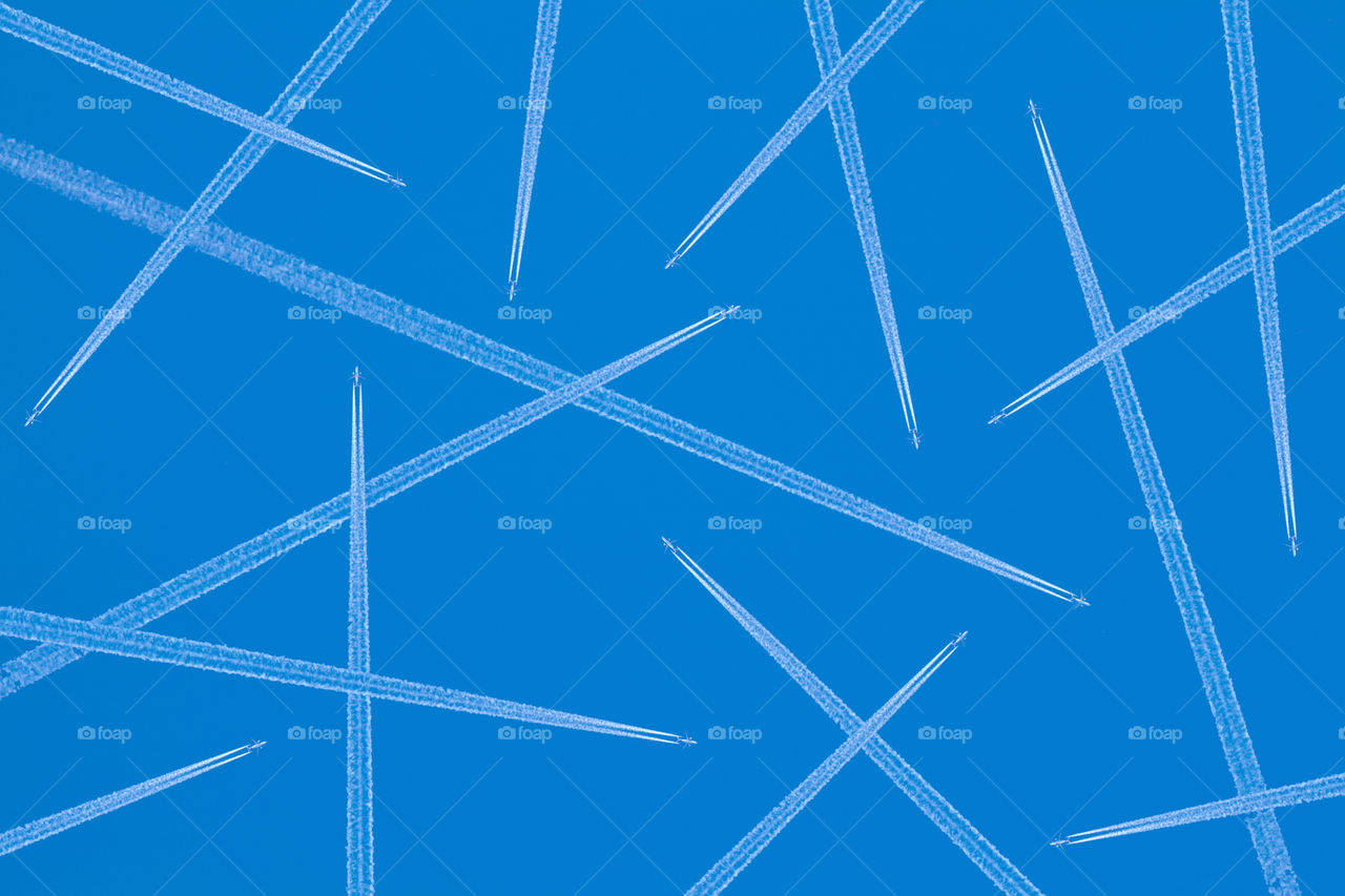 foap com vapor trails from airplanes in mid air stock photo by vapor trails