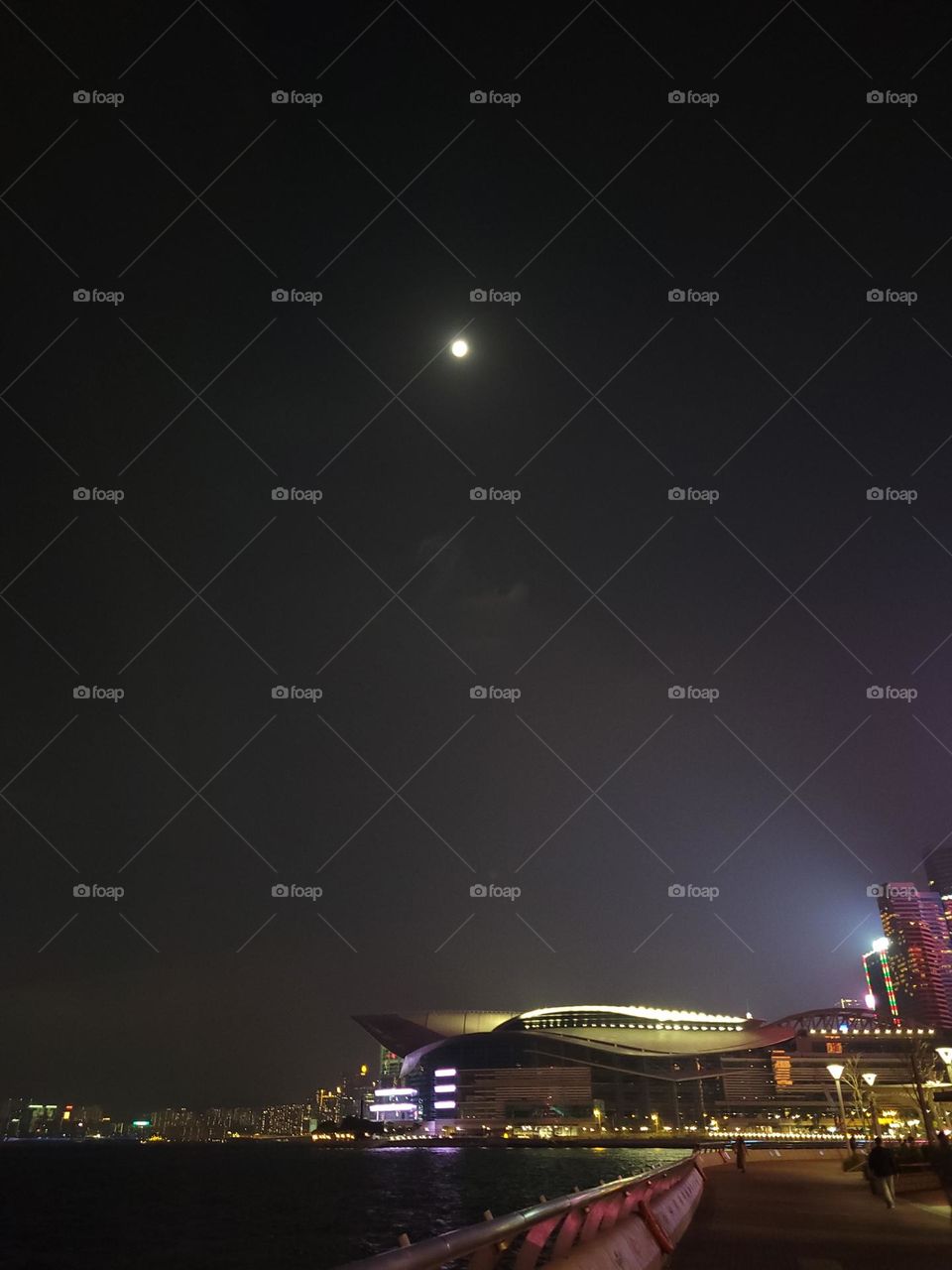 Moon over Convention Centre Victoria Harbour Hong Kong