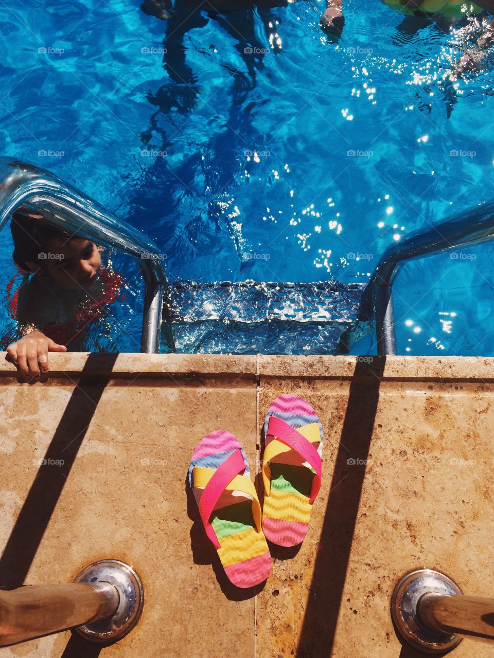 High angle view of people enjoying in pool