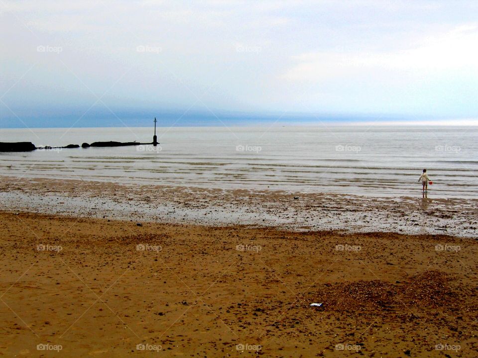 Child playing on the beach 1