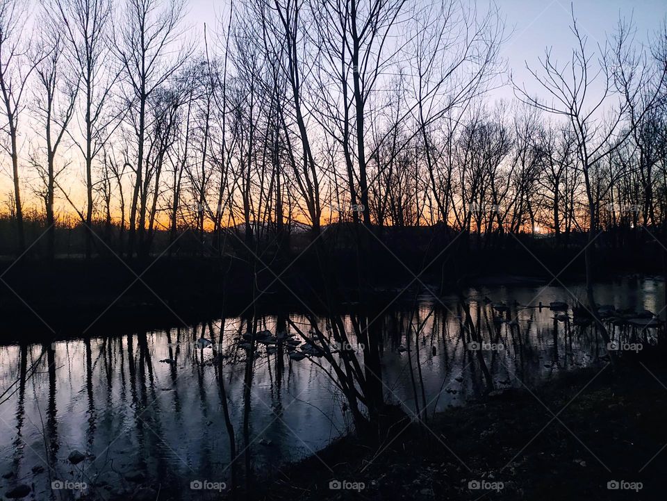 sunset by the river