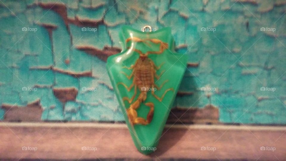 Green scorpion pendant