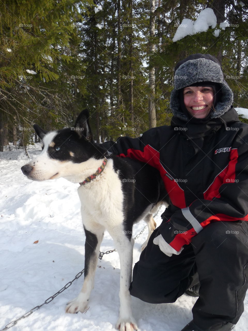 Woman with dog in winter