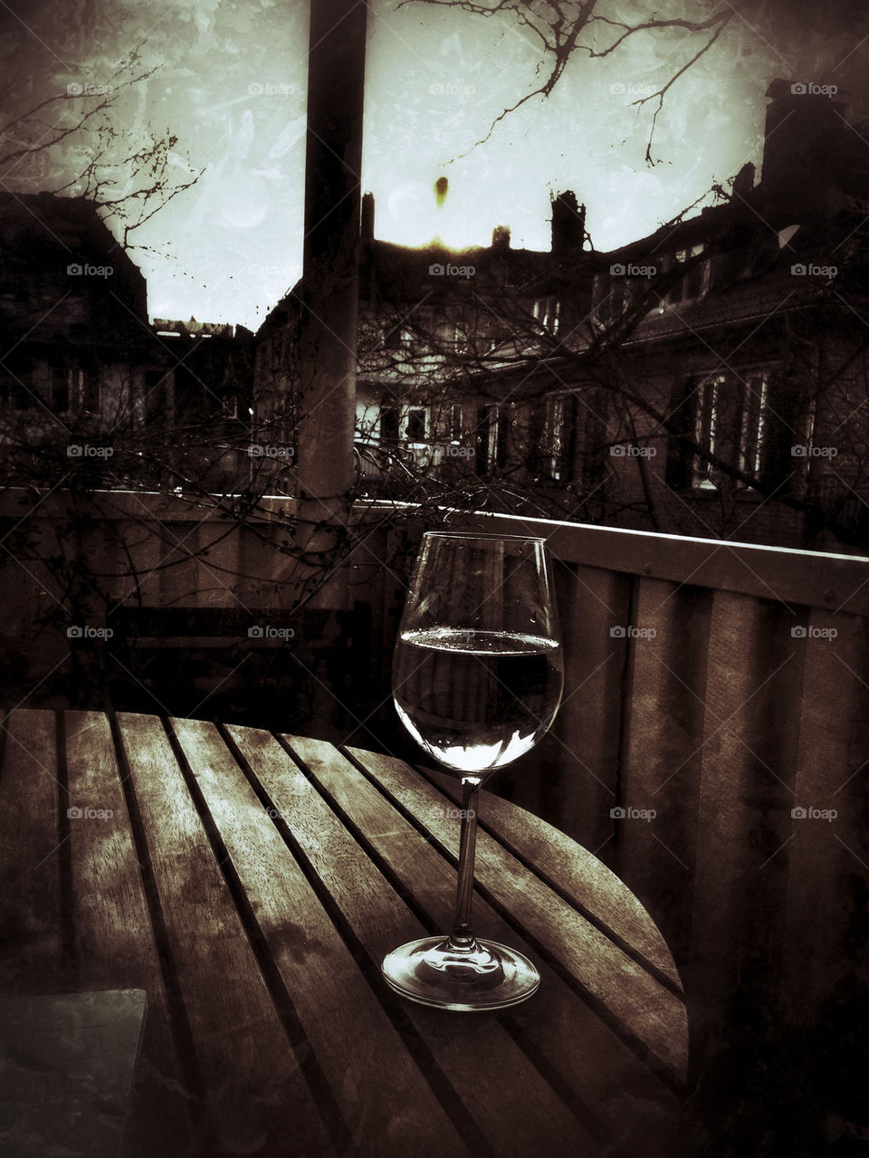 Enyoing a glass of white wine while sundown ...