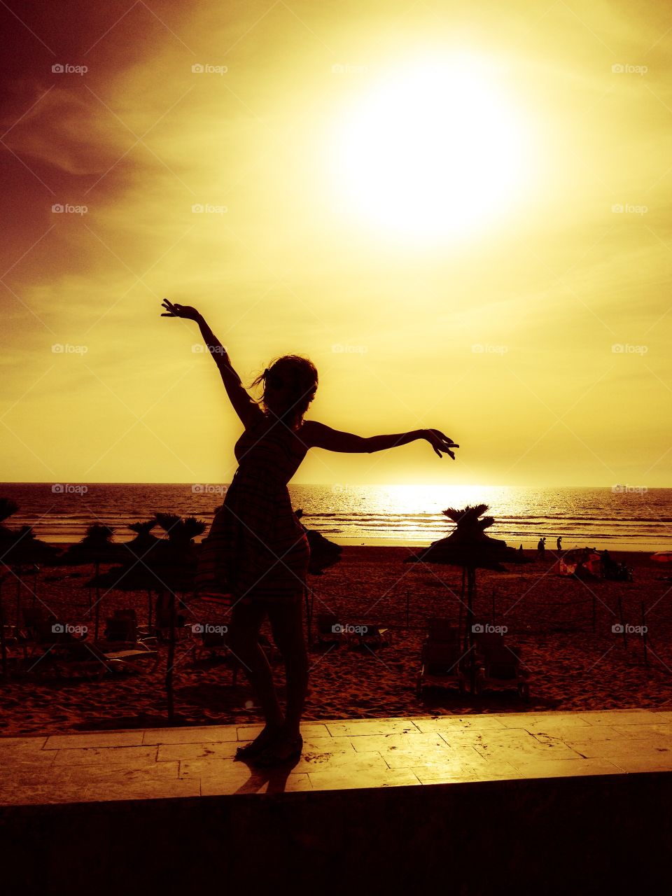 Young woman silhouette . Young woman silhouette on the sunset in Agadir