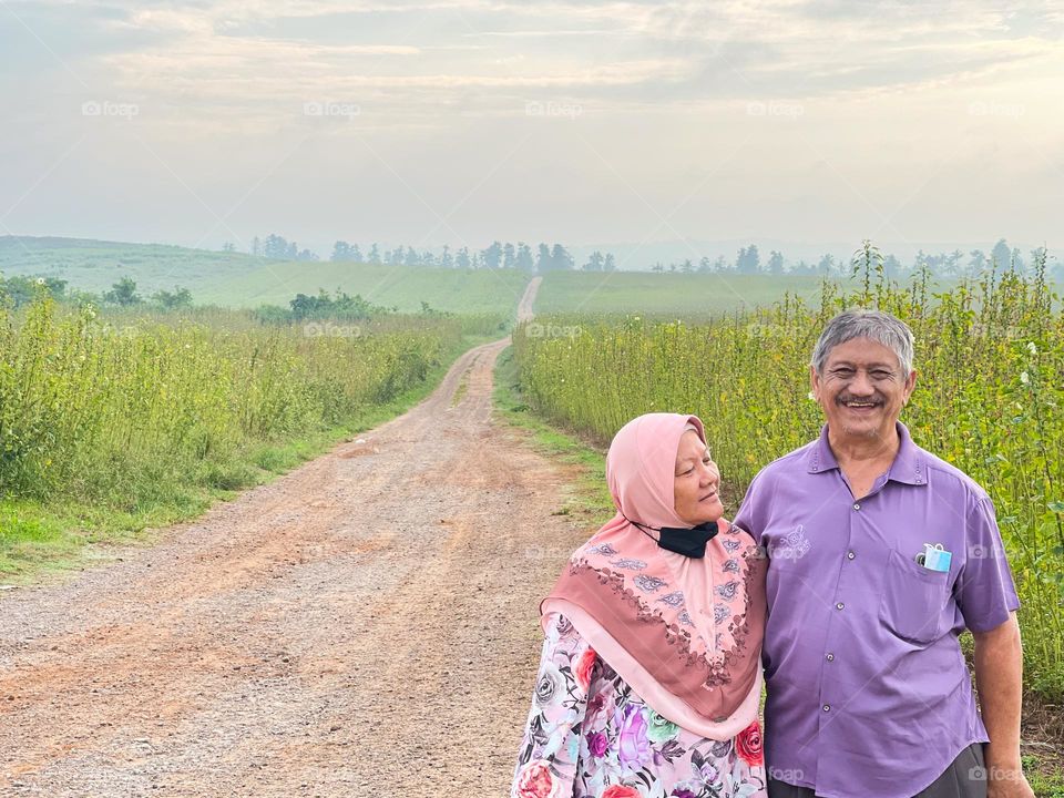 Lovely old couple with great background scenery