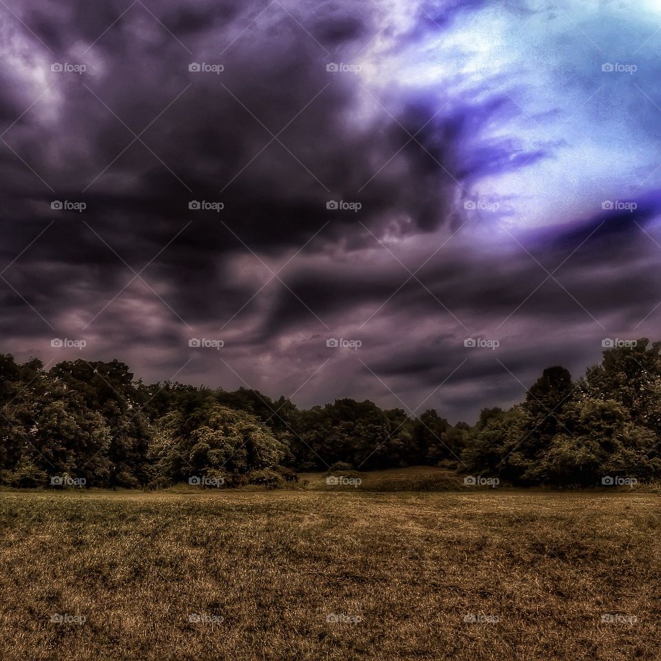 Thunderclouds over the meadow. Severe thunderstorms moving in